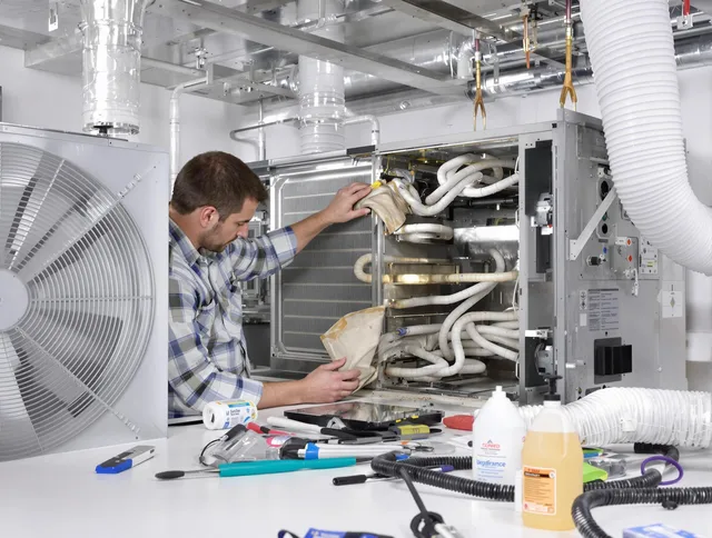 Medway Air Duct Cleaning specialist performing precision AC coil cleaning in Medway