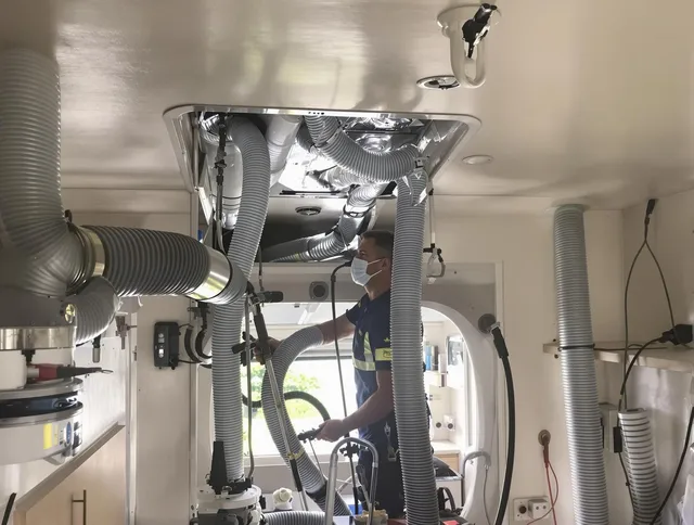 Medway Air Duct Cleaning specialist performing precise mobile home duct cleaning in Medway