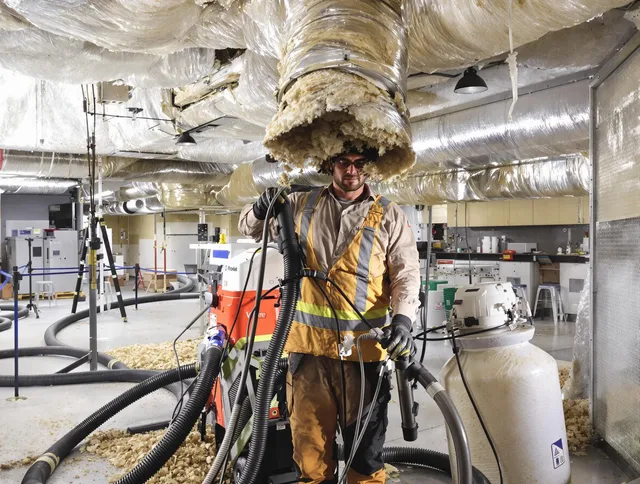 Professional vacuum insulation removal by Medway Air Duct Cleaning expert in Medway
